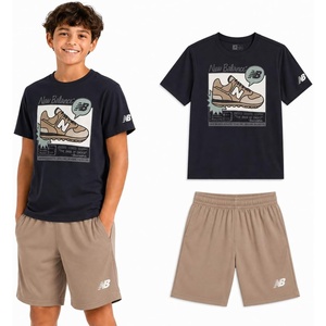New Balance Boys 2 Piece Cotton Blend Jersey Shirt & Basketball Shorts | Bold Front Design, Breathable Short Sleeve Top, Flexible Fit Built for Sports, Play & Confident Everyday Youth Style(Black Stoneware)
