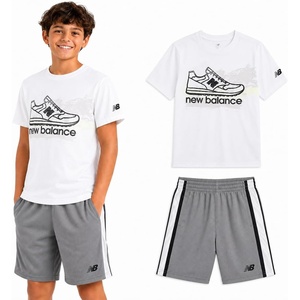 New Balance Boys 2 Piece Cotton Blend Jersey Shirt & Basketball Shorts | Bold Front Design, Breathable Short Sleeve Top, Flexible Fit Built for Sports, Play & Confident Everyday Youth Style(White Sneaker)